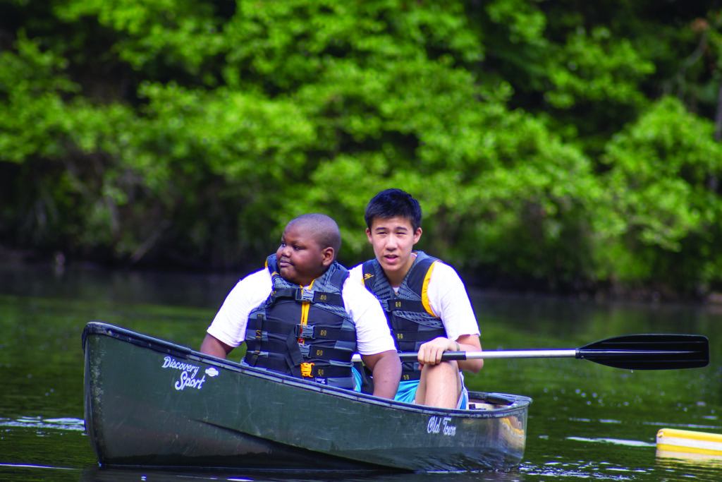 Zakameron enjoys canoeing for the first time.